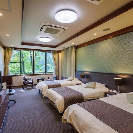 Okutamaji Hotell Ome Exteriör bild