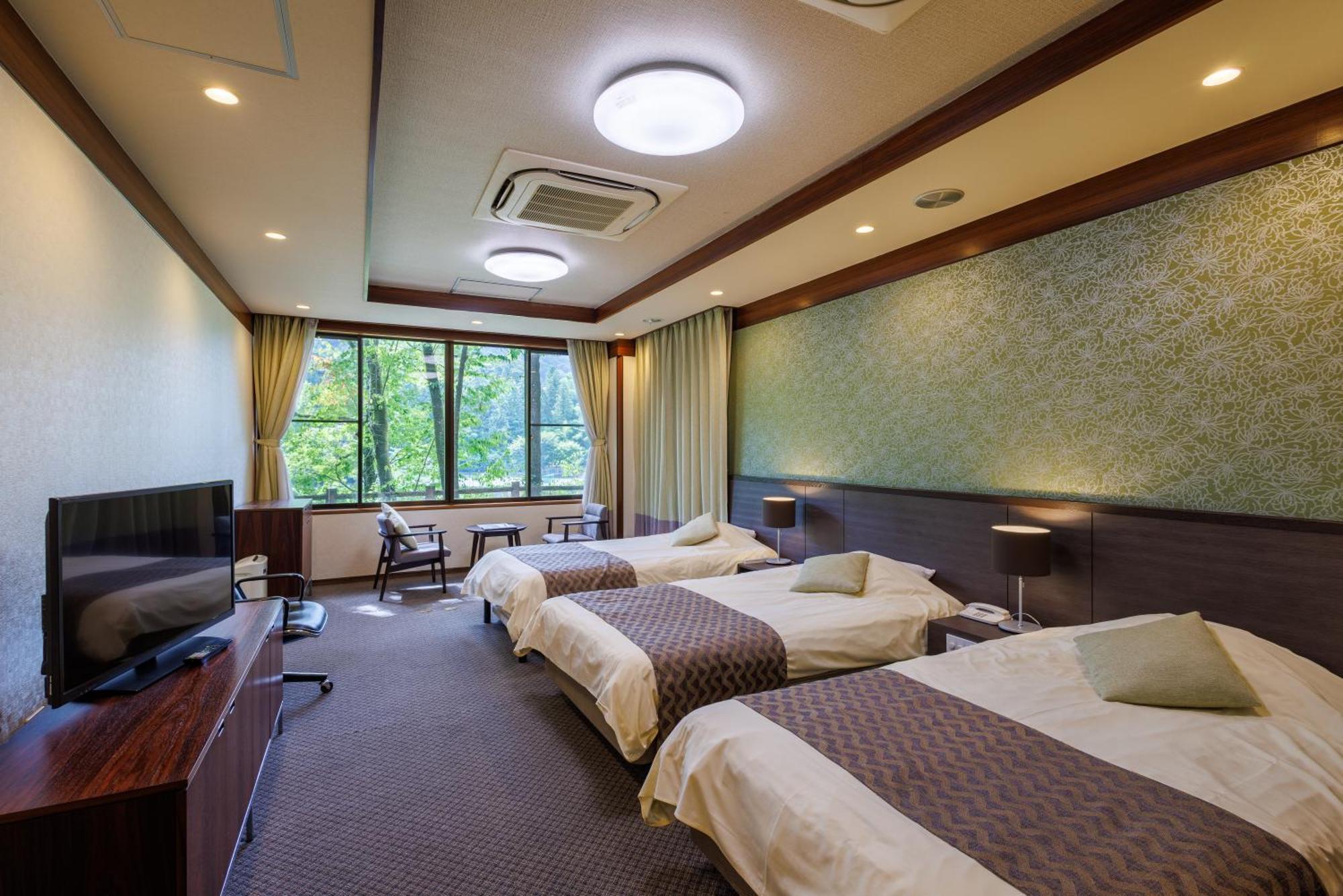 Okutamaji Hotell Ome Exteriör bild