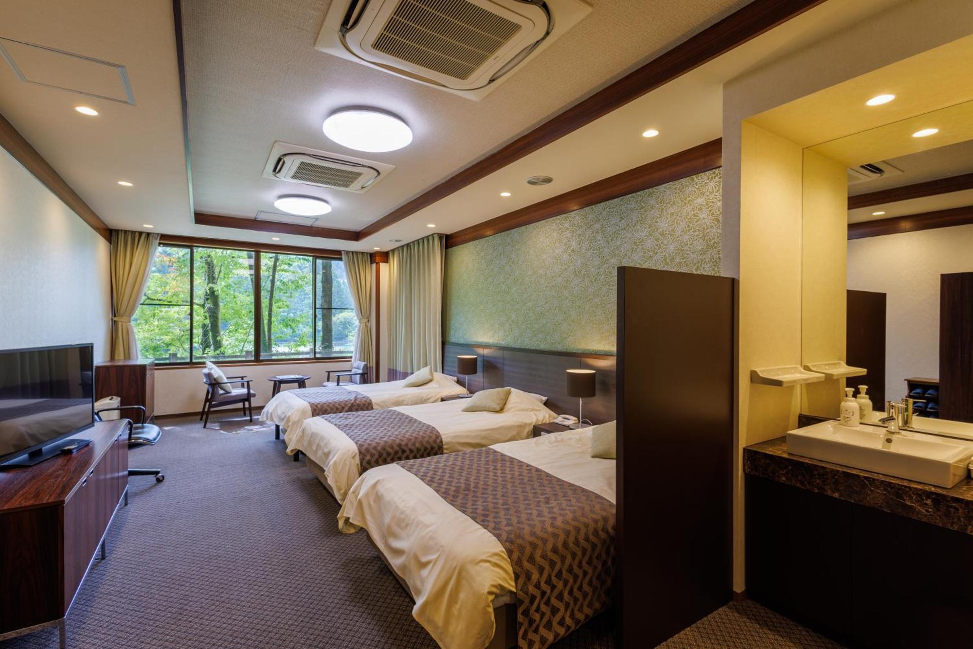 Okutamaji Hotell Ome Exteriör bild